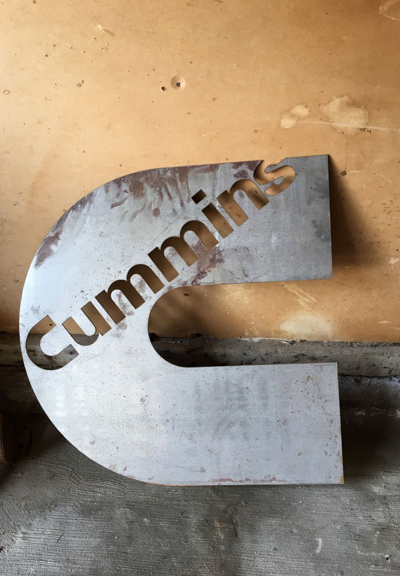 Cummins C metal sign