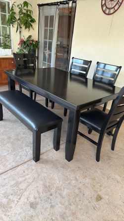 Black Dining table and4 Chairs one bench