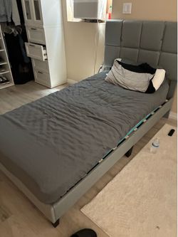 Twin bed frame with mattress