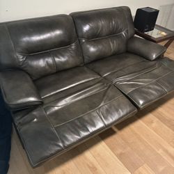 Comfortable leather couch with 2 recliners