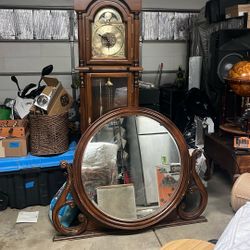 Grandfather Clock And Round Mirror