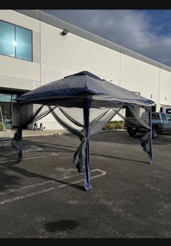 On SALE!! $85 11x11 ft Gazebo Tent with Mosquito Netting, Water Resistance. Blue And White Color