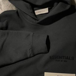 Size XXS essentials Fear of God hoodie in Black Limo. Comfortable and stylish.