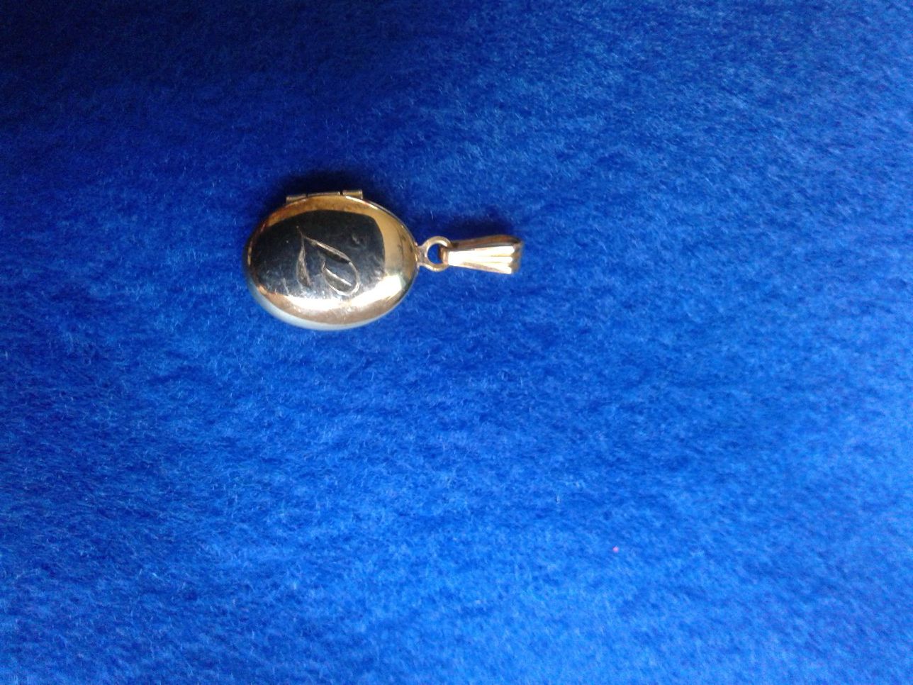 Sterling locket with letter L