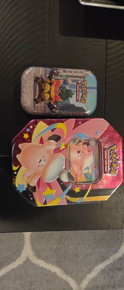 Pokemon Moonlit tin and Luminous City mini tin