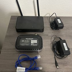 Netgear Router, Modem, And Cables 