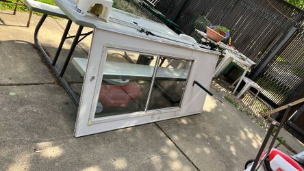 Storm door white color, half glass half screen 30” x 80”