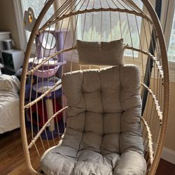 egg swing chair with frame and cushion