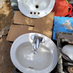 Four residential/, commercial Sinks.