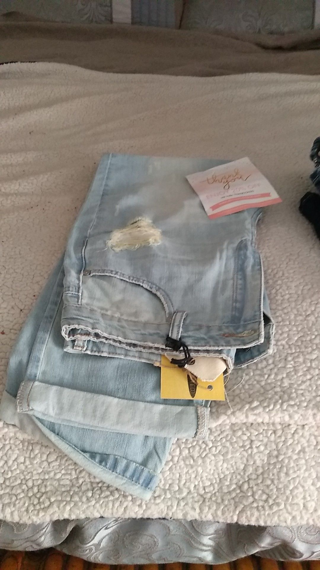 New blue jeans size for capris never been worn still have the paperwork with them