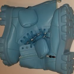 Brand new Boots with extra mini pouches. 