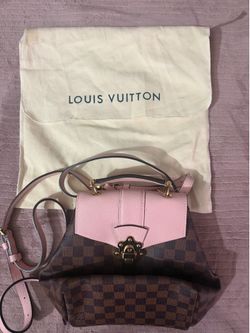 Brown and pink backpack