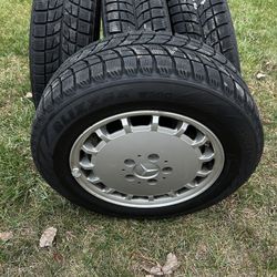 A set of 4 wheels with rims/195/65 R15 91R