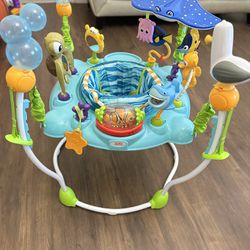 Bright Starts Disney Baby Finding Nemo Sea of Activities Baby Activity Center Jumper with Interactive Toys, Lights, Songs & Sounds