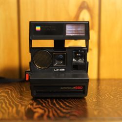 Vintage Polaroid Sun 660 Autofocus Instant Camera
