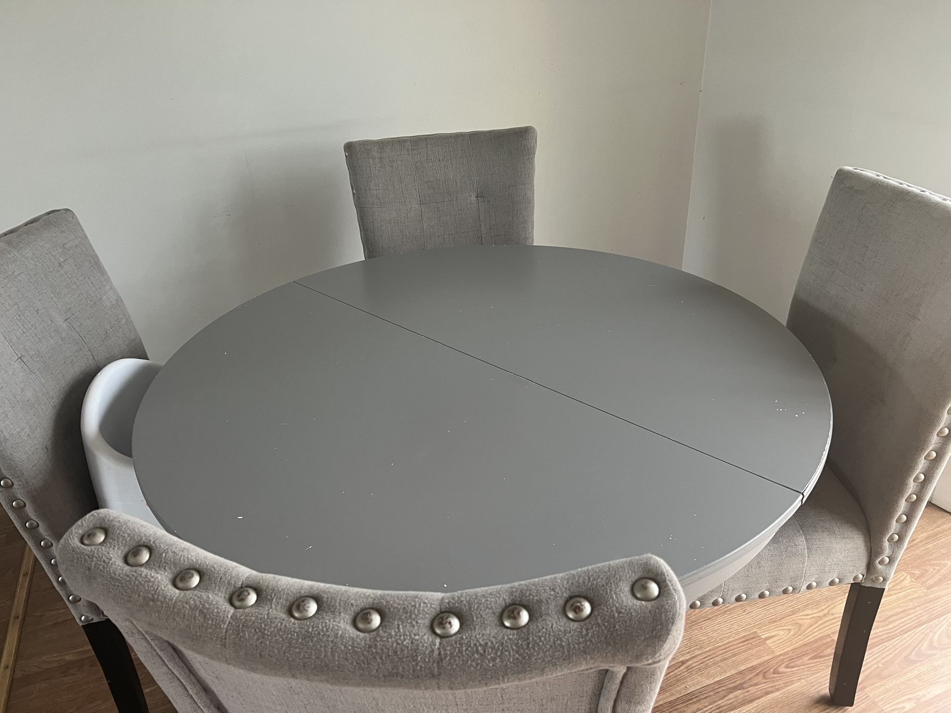 chairs and adjustable dining table
