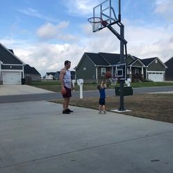 Goaliath 54 inch in ground basketball hoop, adjustable basketball court