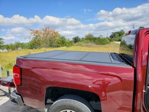 Photo Bakflip Hard tri folding tonneau cover Fits: 2014-2018 Chevy Silverado/GMC Sierra