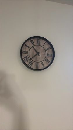 Black and wood clock