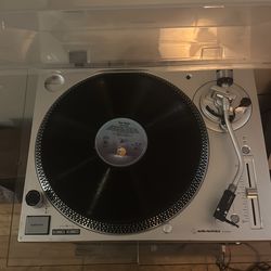 Turntable with receiver and mixer plus two shelf speakers