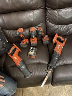2 Saw Saws 2 Drills And 1 Compact Drill And 4 Battery’s 300 Firm 