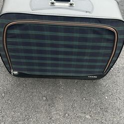 32”x23” hard plastic luggage almost new