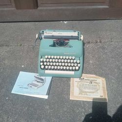 1961 Alpine Blue Smith Corona Sterling portable typewriter 

