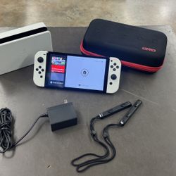 Nintendo Switch OLED W base and case no trades pick up in Tacoma FIRM PRICE