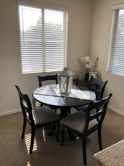 Round dining table with chairs