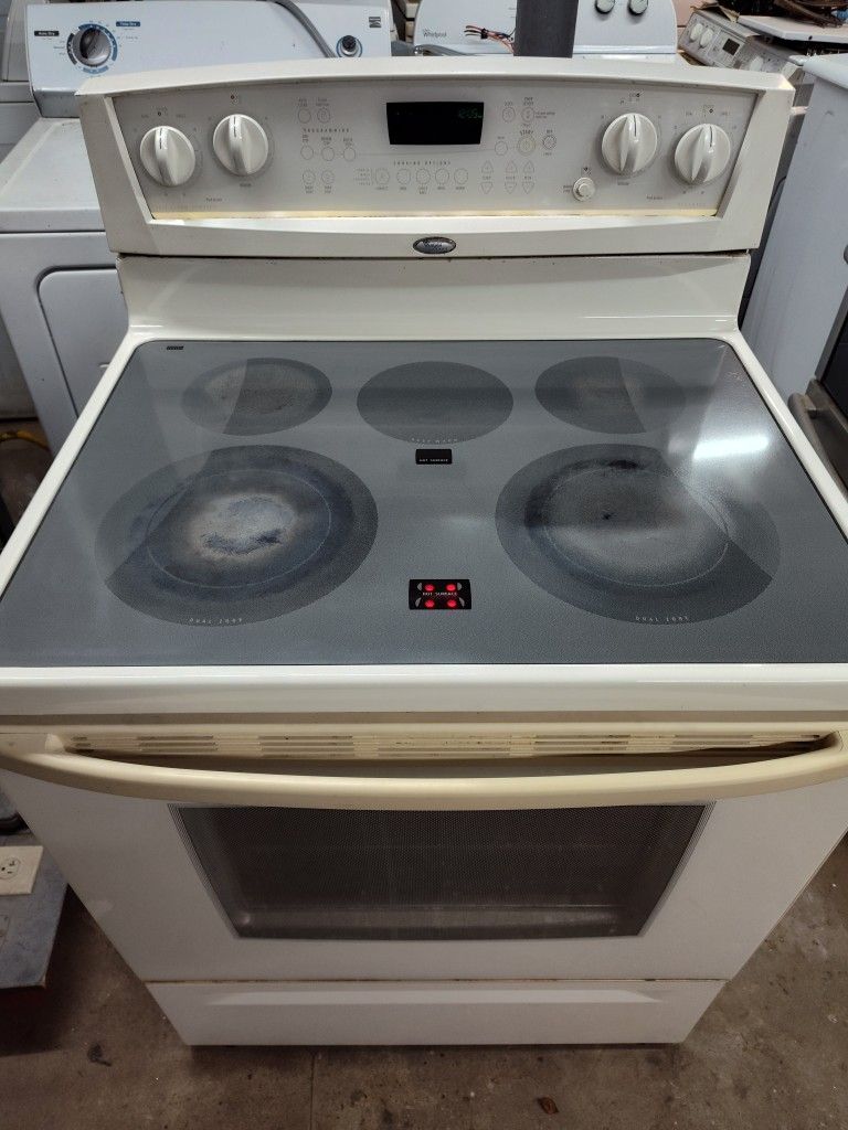 WHIRLPOOL SELF CLEANING OVEN 5 ELEMENTS GLASS TOP ELECTRIC STOVE IN BEIGE