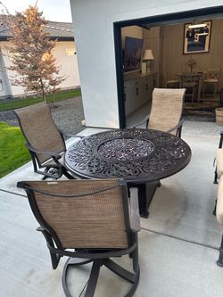 Fire pit and three chairs