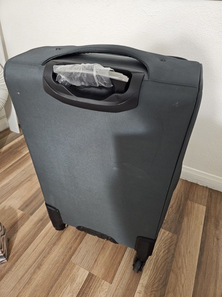 Non-carry-on travel suitcase