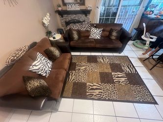 Animal print Living room set; 2 couch 1 rug