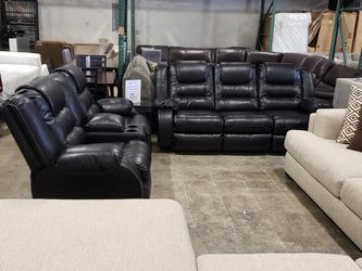 Reclining sofa and love seat available for immediate delivery