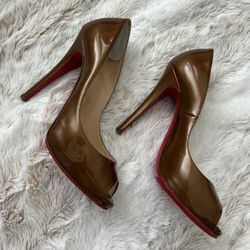 Christian Louboutin Heels (Red Bottoms) 