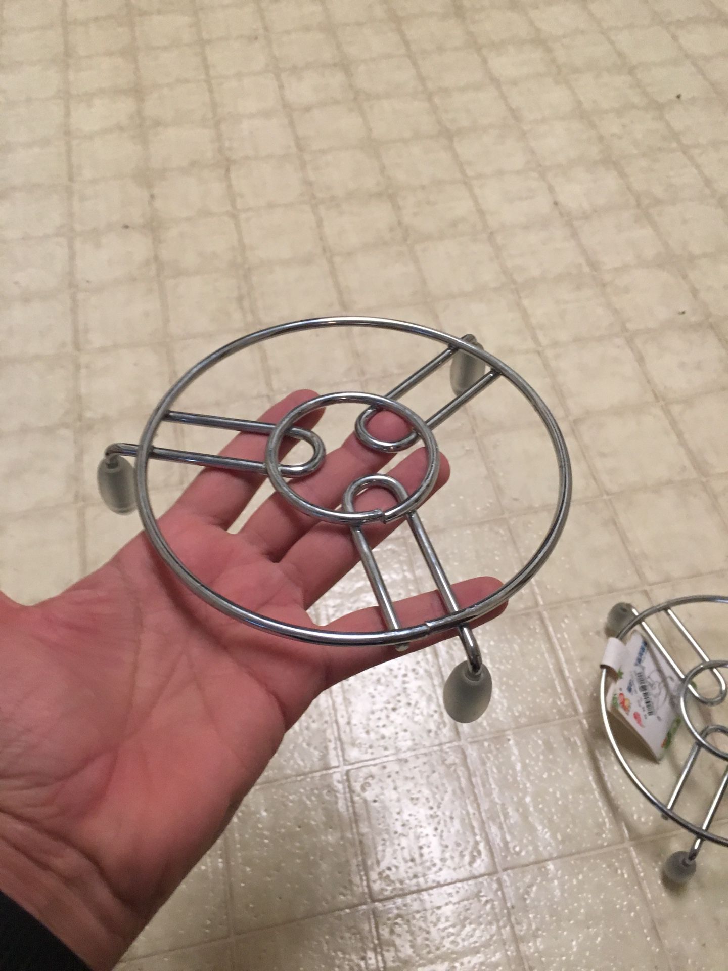 Table Utensil Stand. Brand New. Never Used. Made of high quality stainless steel and have rubber feet. This is used in kitchen to keep Utensil over i