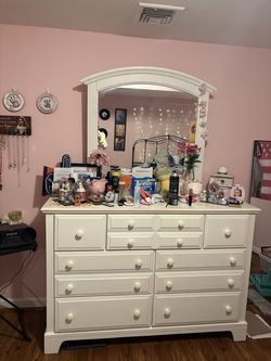 Queen size metal bed and white dresser