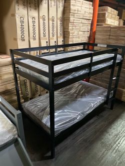 Twin bunk bed. Comes in espresso. Assembly required. Assembly not included. Taxes included. Free delivery.  Bunk bed only-$220 Bunk bed with mattresse