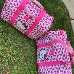 HELLO KITTY STYLISH PINK AND WHITE ROLLING DUFFLE/TRAVEL BAG  o  