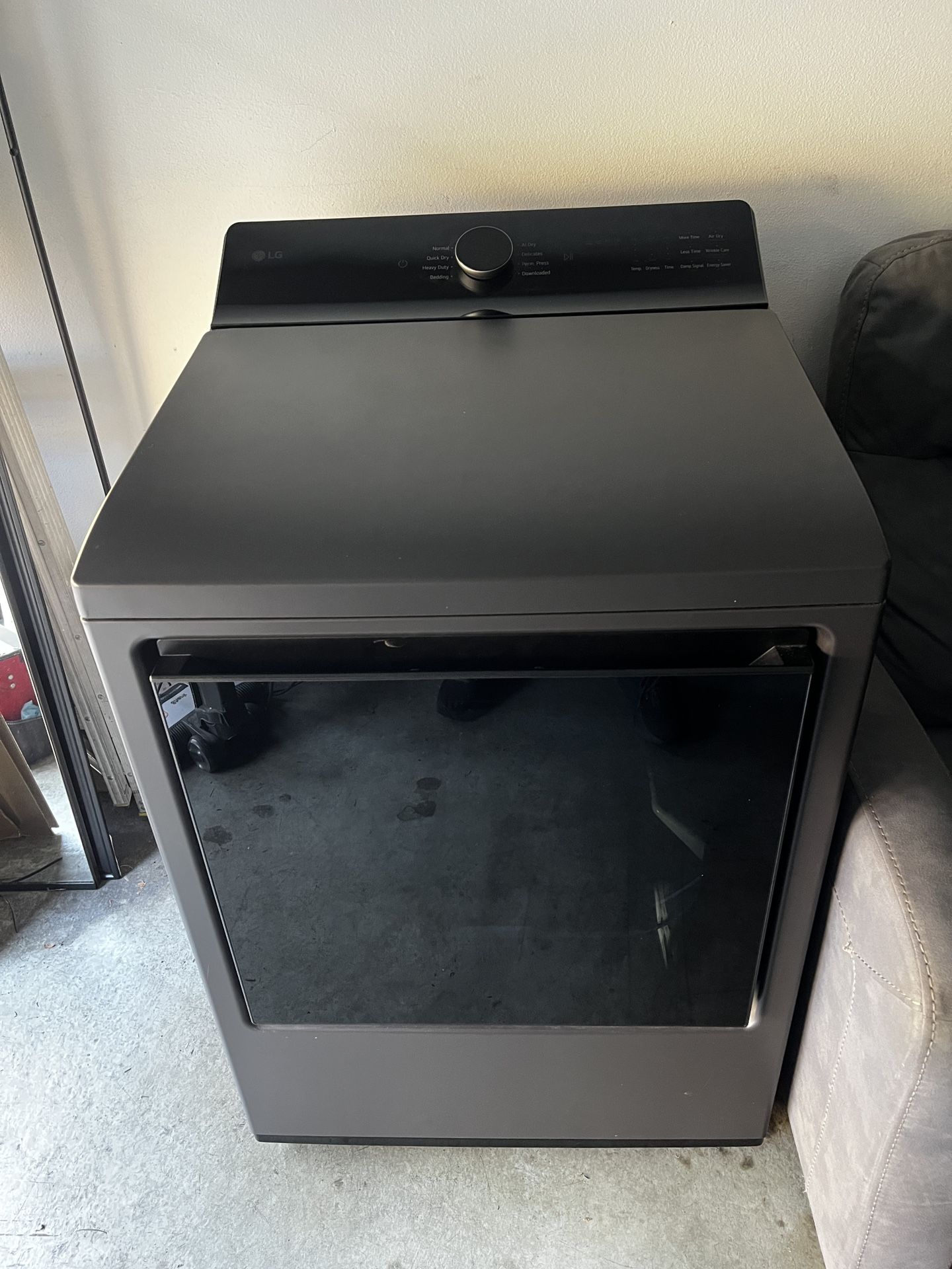 LG 7.3 cu. ft. Vented Smart Electric Dryer in a matte black finish (model DLE8400BE)