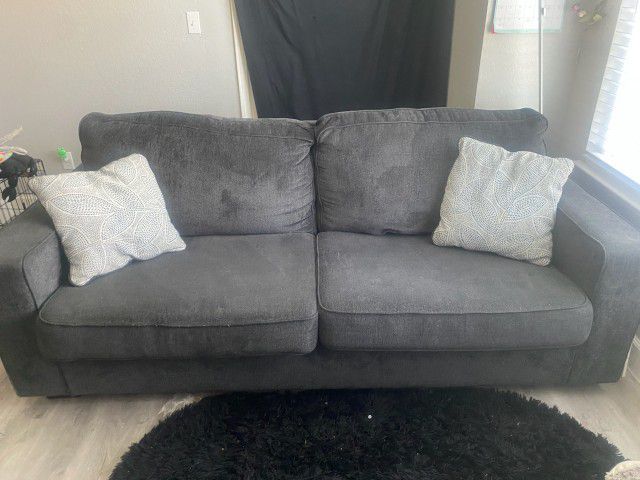 Grey fold-out sofa