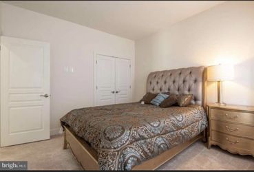 Champagne Gold Queen sized bed and Matchibg Nightstand
