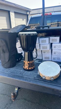 Drum and two tambourines with drum case