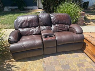 Free rustic storage coffee table and 2seat recliner.