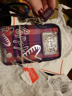 New coach wristlet with receipt and package