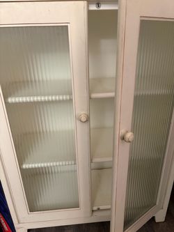 White Wood Cabinet with Ribbed Glass Doors