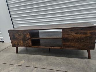 Wooden TV stand with side cabinets