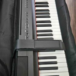 Yamaha P125 piano keyboard