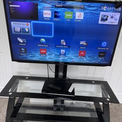 Samsung Tv With The Tv Stand.