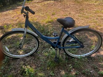 Lightweight aluminum frame Next La Jolla Street Cruiser bike in blue.
